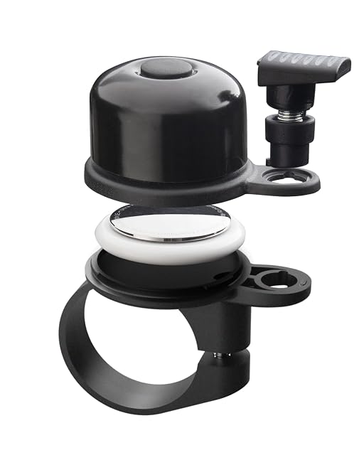 Campanello AIRBELL montato su un manubrio, con lo scomparto nascosto del tag aperto